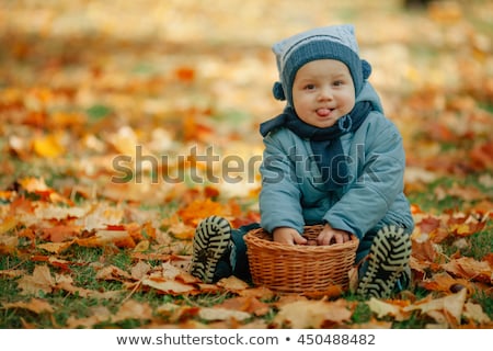 Foto stock: Little Baby Boy In The Autumn Park