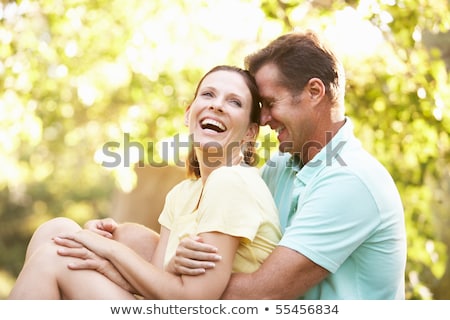 Zdjęcia stock: Happy Couple Having A Walk In The Woods