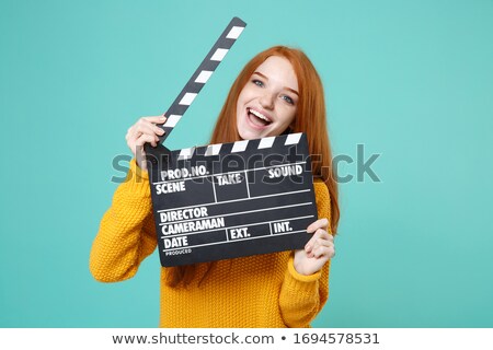 Stok fotoğraf: Woman With A Clapperboard