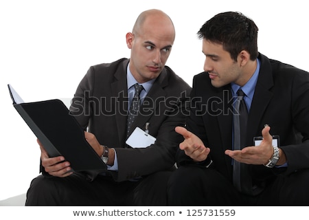 [[stock_photo]]: Looking Commercial Catalog In A Waiting Room