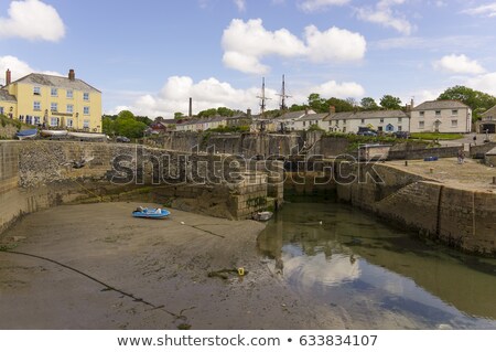 Stock photo: Harbour At Low Tide With Fishing Boats In Old Cornish Fishing Village