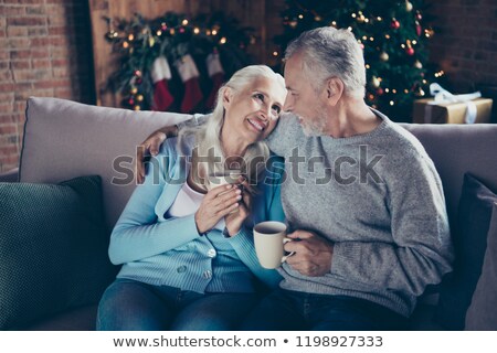 Сток-фото: Couple Drinking Tea In Winter Look