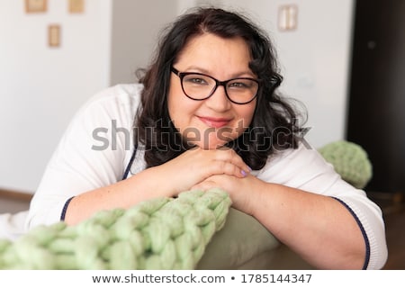 [[stock_photo]]: Brunette Model On Sofa