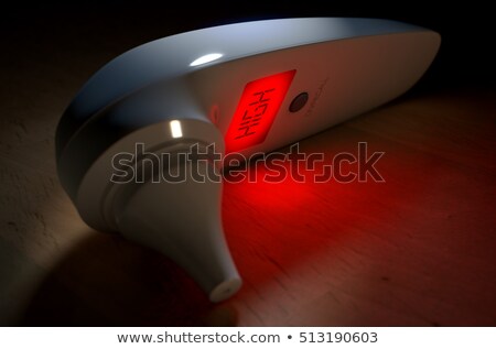 Сток-фото: Child Ear Thermometer High Red