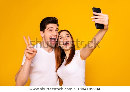 Foto d'archivio: Young Couple Taking Self Portrait