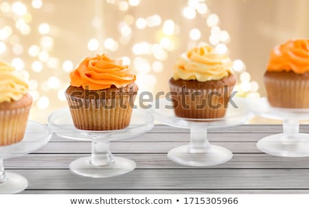 Foto stock: Cupcake With Frosting On Confectionery Stand