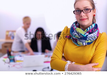 Stock photo: Woman Decorator Showing Swatches