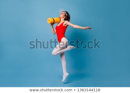 Foto stock: Beautiful Slender Woman In A White Leotard