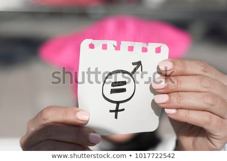 Foto stock: Woman With Pussyhat And Symbol For Gender Equality