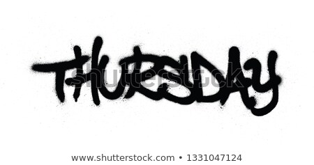 Foto stock: Graffiti Thursday Word Sprayed In Black Over White