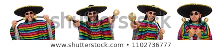 Handsome Smiling Man With Maracas Stock photo © Elnur