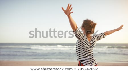 [[stock_photo]]: Beautiful Young Woman Relaxing At Beach In Summer