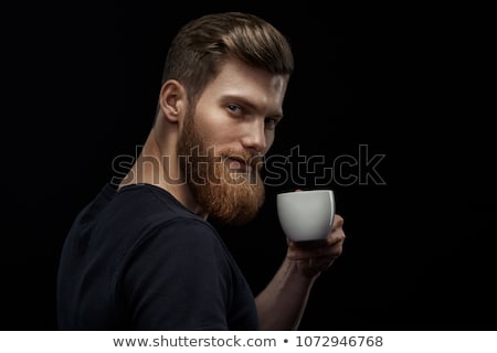 ストックフォト: Young Man Drinking A Cup Of Expresso