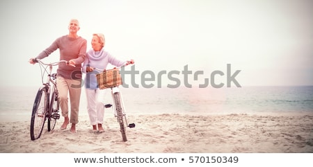 Foto stock: Couple Walking On A Beach