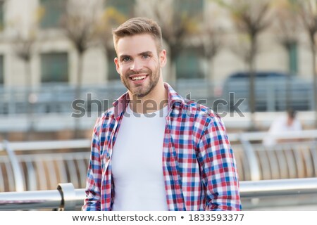 Stok fotoğraf: Smiling Businessman Dressed In Shirt Walking Outdoors