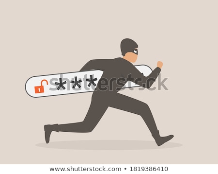 Foto stock: Man Stealing Data From A Laptop