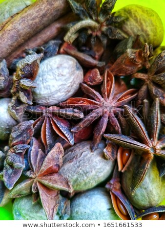 Stok fotoğraf: Mandarins With Cinnamon Star Anise And Cardamom On Black