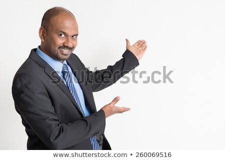 Zdjęcia stock: Smiling Aged Man Pointing Away