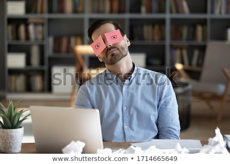 ストックフォト: Tired Businessman With Paperwork At Desk