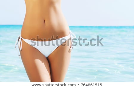 Foto stock: Sporty Bikini Fitness Tanned Body Woman On Beach