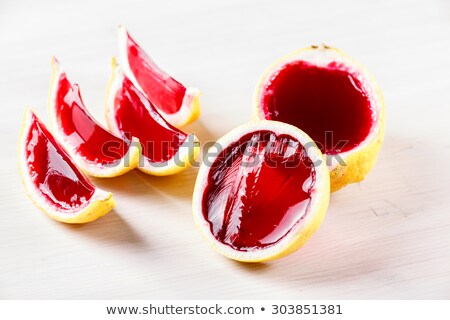 Foto stock: Vodka Jelly Jello Shots Made Out Of Carved Lemon