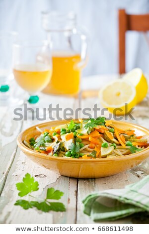 Pasta With Grilled Vegetables And Some Wine Foto stock © mpessaris