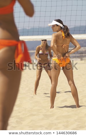 Stockfoto: Rear View Of Volleyball Player Playing With Teammates