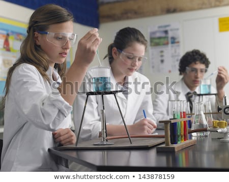 Stok fotoğraf: Boy Looking At Test Tubes