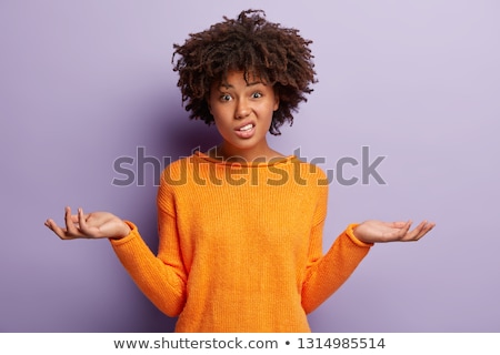 Stock fotó: Shrugging Woman In Doubt