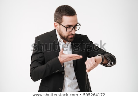 Stock photo: Shocked Businessman Looking At The Time