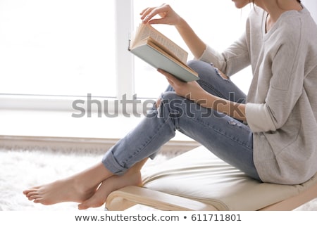 Stockfoto: Girl Relaxing With Book