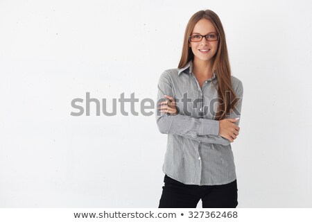 Сток-фото: Businesswoman Leaning On The Wall In Office