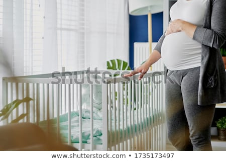 Stock fotó: Pregnant Woman In Nursery