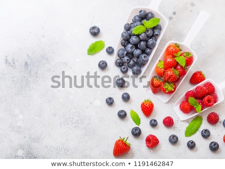 Foto stock: Fresh Raw Organic Berries In White Wooden Box On White Kitchen Table Background Space For Text Top