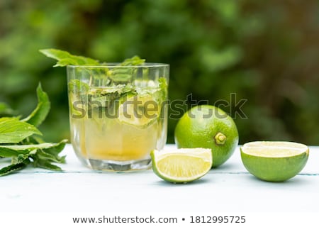 Stok fotoğraf: Holidays And Drink Concept Cold Cocktail Lemonade With Lemon