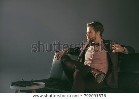 ストックフォト: Businessman Looking At A Glass Of Whisky