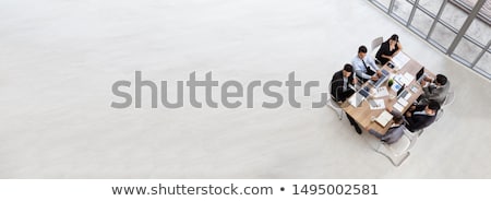 Stock foto: Business Team On Table In Office Conference