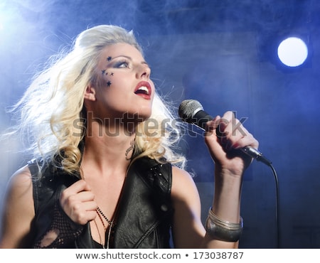 Stock fotó: Beautiful Blonde Rock Star On Stage Singing