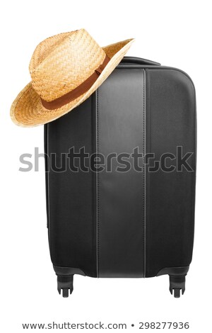 Stok fotoğraf: Black Traveler Suitcase And A Straw Hat