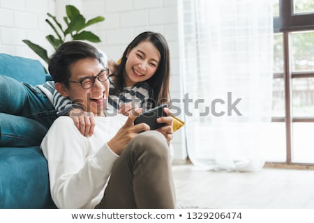 Foto stock: A Business Couple Laughing At Work