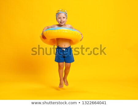 Foto stock: Children Colored Swimsuit