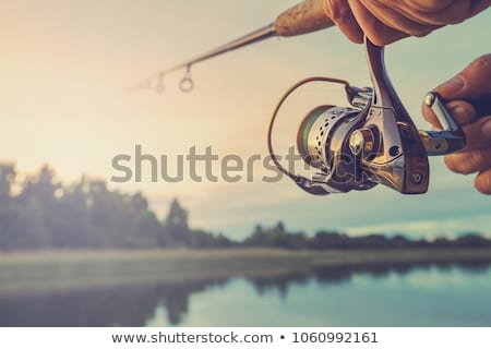 Сток-фото: Man Out Fishing On The Lake