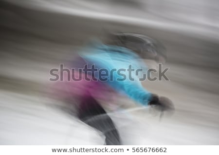 Foto stock: Motion Blurred Image Of An Expert Skier