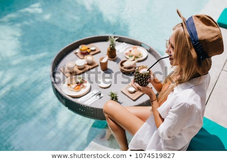 Stock photo: Blonde Woman By The Pool