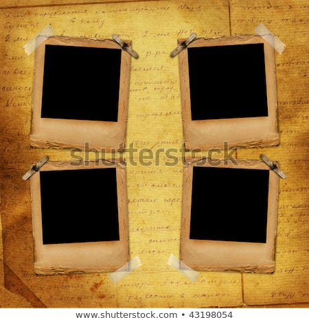 Foto stock: Old Grunge Paper Slides On The Ancient Background