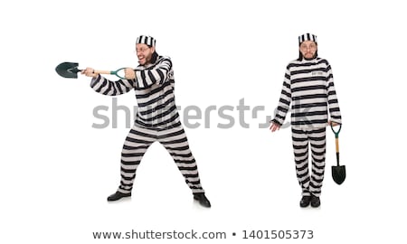 Foto stock: Prison Inmate With Spade Isolated On White
