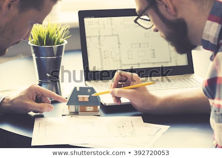 Stock foto: Architect Showing New Family House Model To Customer At Office