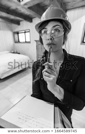 Stock photo: Woman In The Construction Hardhat