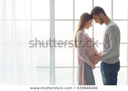 Foto stock: Happy Family Lifestyle Young Couple Are Expecting A Baby