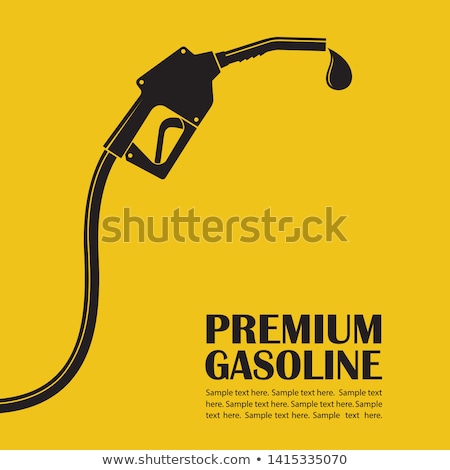 Foto stock: Gas Pump Nozzles At A Gasoline Station